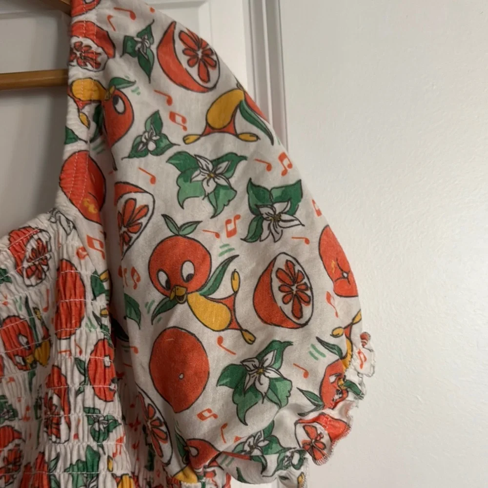 Disney Orange Bird White and orange Smocked Puff Sleeve Blouse - Picture 2 of 5